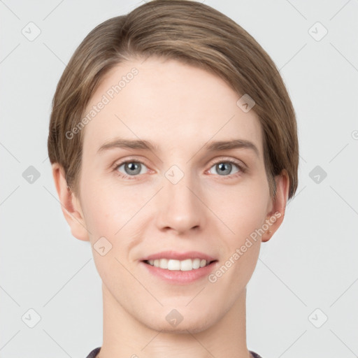 Joyful white young-adult female with short  brown hair and grey eyes