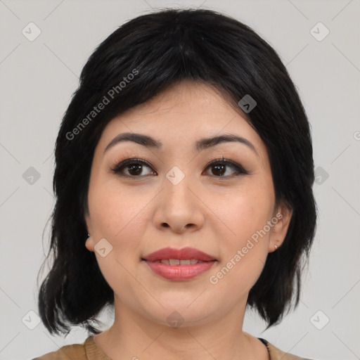 Joyful asian young-adult female with medium  black hair and brown eyes