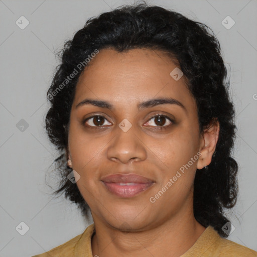 Joyful black young-adult female with medium  black hair and brown eyes