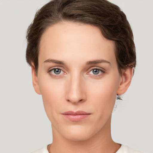 Neutral white young-adult female with short  brown hair and brown eyes