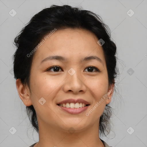 Joyful asian young-adult female with short  brown hair and brown eyes