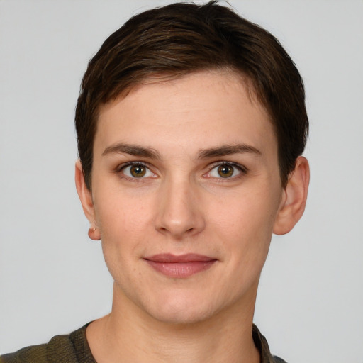 Joyful white young-adult female with short  brown hair and grey eyes