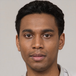 Neutral latino young-adult male with short  black hair and brown eyes