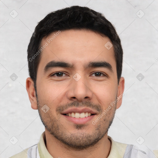 Joyful white young-adult male with short  black hair and brown eyes