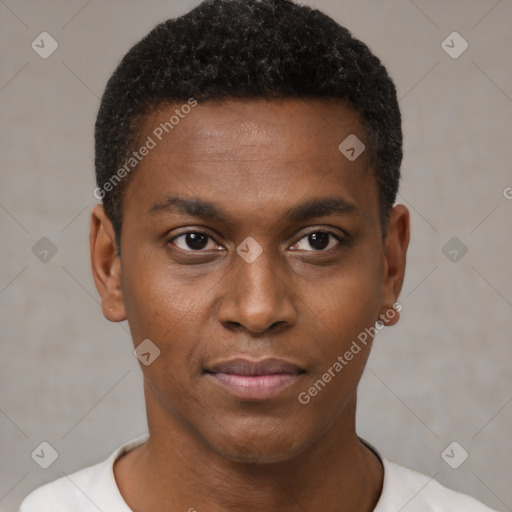 Joyful black young-adult male with short  brown hair and brown eyes