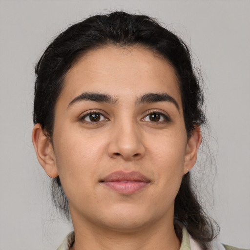 Neutral latino young-adult female with medium  black hair and brown eyes