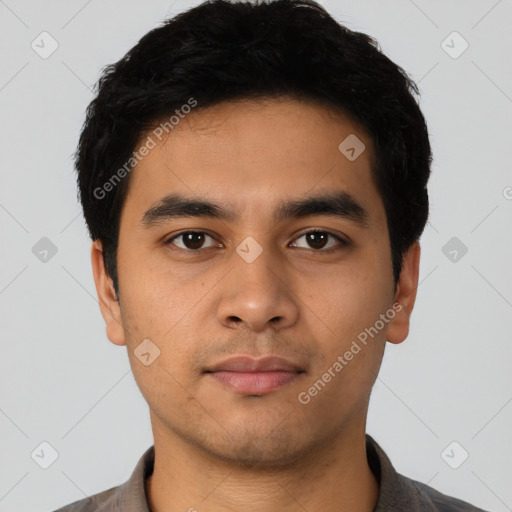 Neutral latino young-adult male with short  black hair and brown eyes