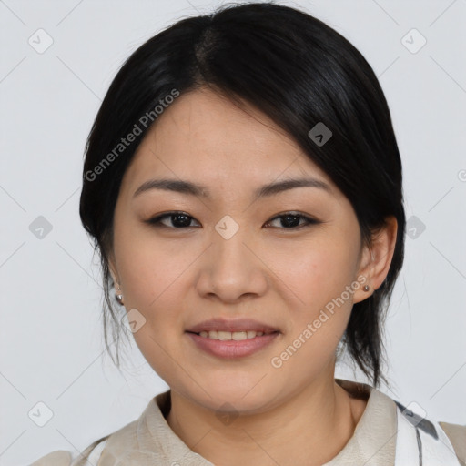 Joyful asian young-adult female with medium  black hair and brown eyes