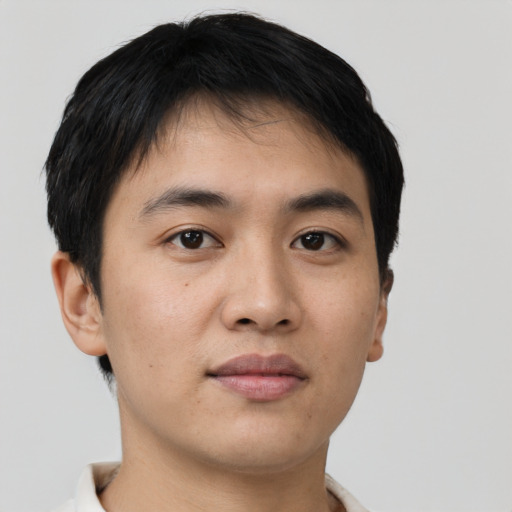 Neutral asian young-adult male with short  brown hair and brown eyes