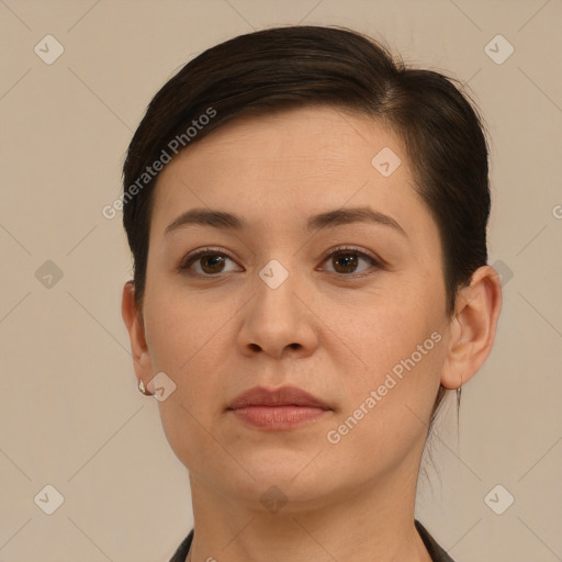 Neutral white young-adult female with short  brown hair and brown eyes