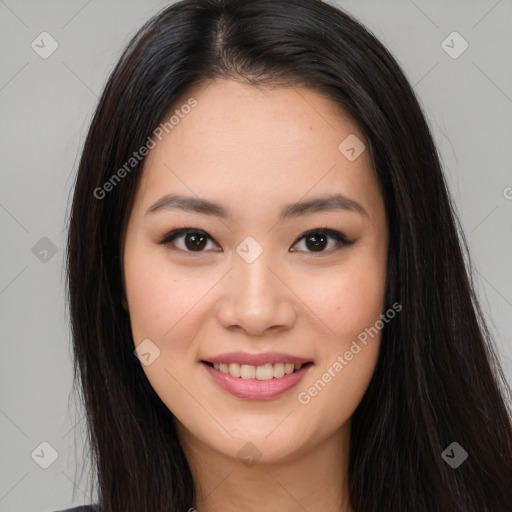 Joyful asian young-adult female with long  brown hair and brown eyes