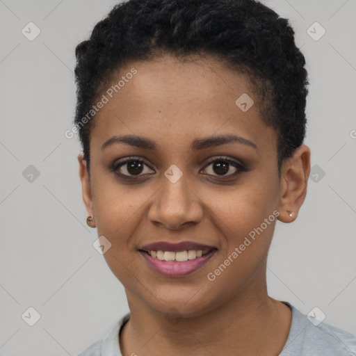 Joyful black young-adult female with short  black hair and brown eyes