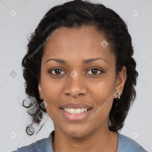 Joyful black young-adult female with medium  brown hair and brown eyes