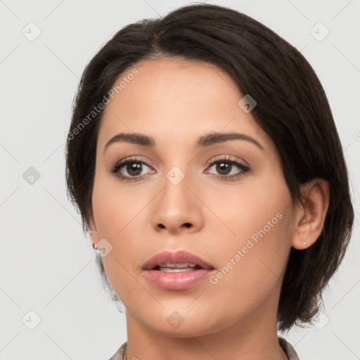 Neutral latino young-adult female with medium  brown hair and brown eyes