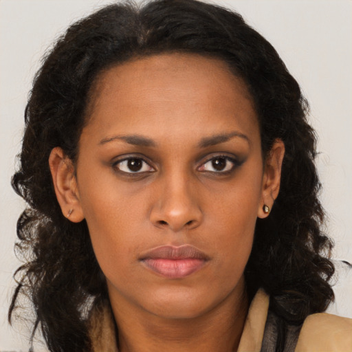 Neutral black young-adult female with long  brown hair and brown eyes