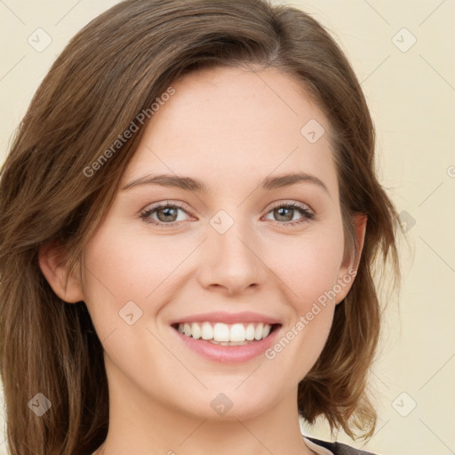 Joyful white young-adult female with medium  brown hair and green eyes