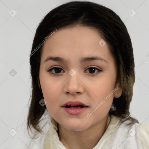 Joyful white child female with medium  brown hair and brown eyes