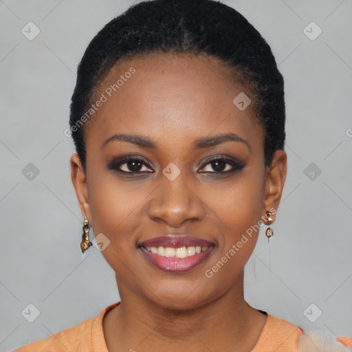 Joyful black young-adult female with short  black hair and brown eyes