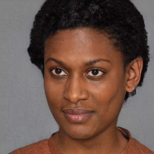 Neutral black young-adult female with short  black hair and brown eyes