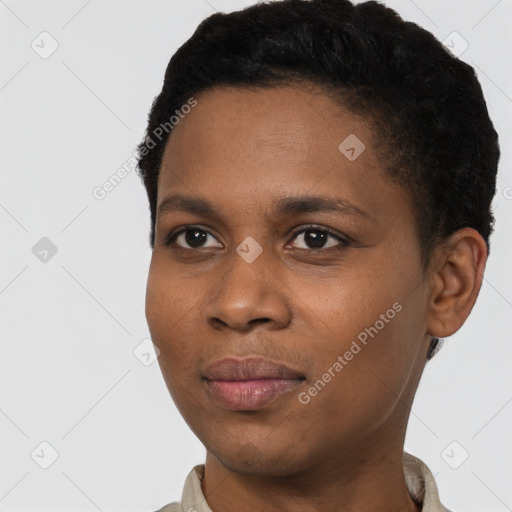 Joyful black young-adult female with short  black hair and brown eyes