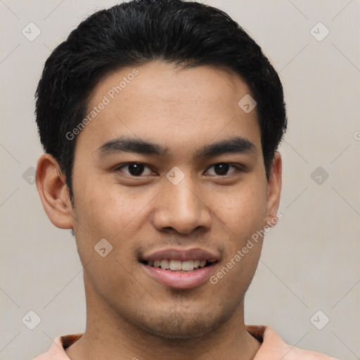 Joyful asian young-adult male with short  black hair and brown eyes