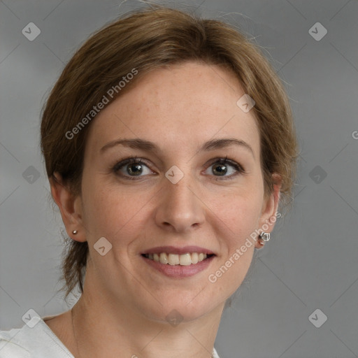 Joyful white adult female with medium  brown hair and grey eyes