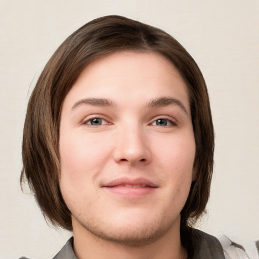 Neutral white young-adult female with medium  brown hair and grey eyes