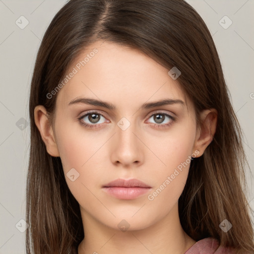 Neutral white young-adult female with long  brown hair and brown eyes