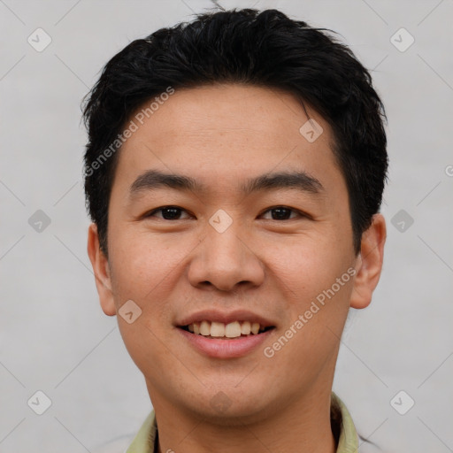 Joyful white young-adult male with short  black hair and brown eyes