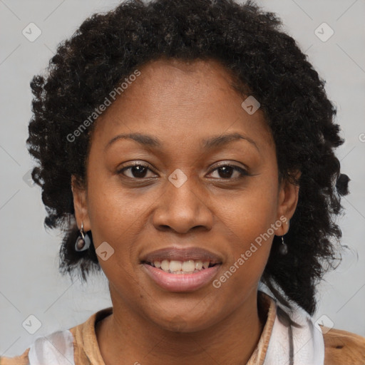 Joyful black adult female with short  brown hair and brown eyes