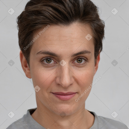 Joyful white adult female with short  brown hair and brown eyes