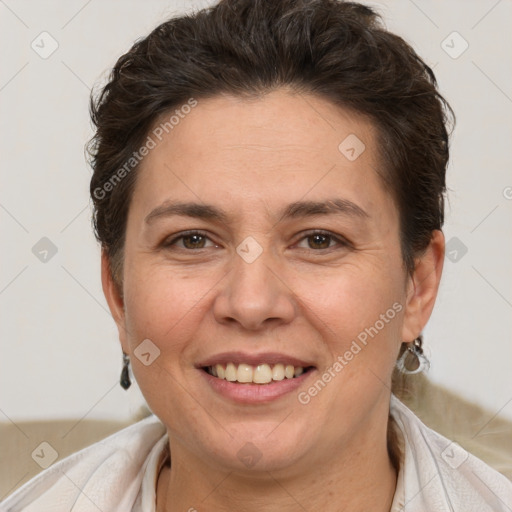 Joyful white adult female with short  brown hair and brown eyes