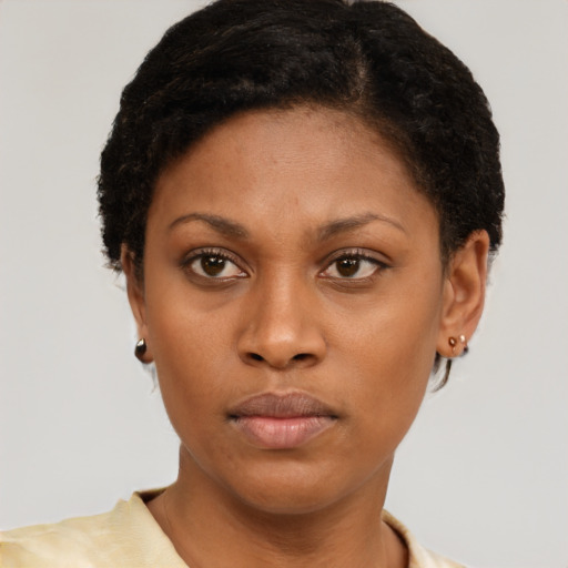Neutral black young-adult female with short  brown hair and brown eyes