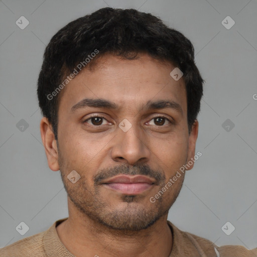 Joyful latino young-adult male with short  brown hair and brown eyes