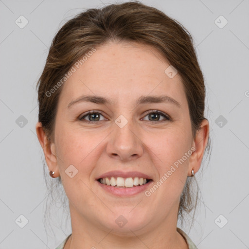 Joyful white young-adult female with medium  brown hair and grey eyes