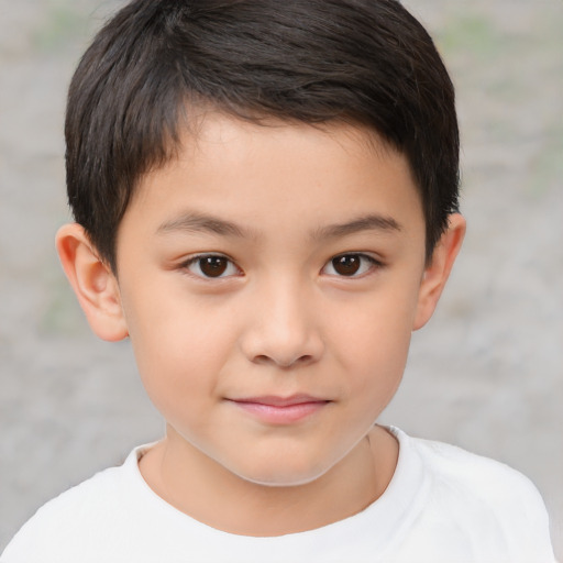 Joyful white child male with short  brown hair and brown eyes