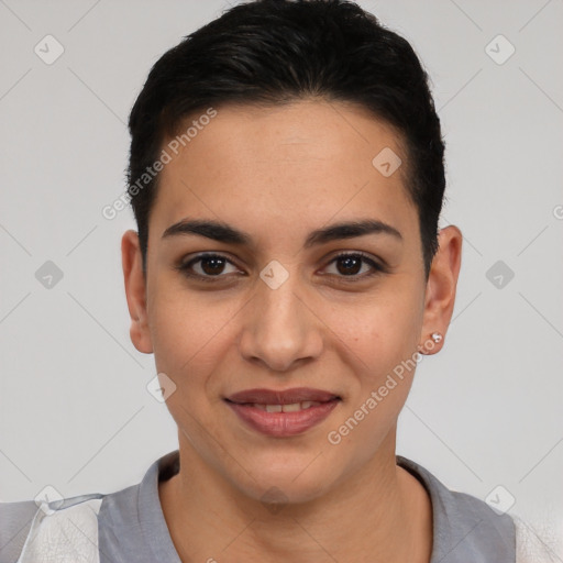 Joyful latino young-adult female with short  black hair and brown eyes