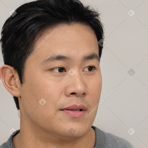 Neutral asian young-adult male with short  brown hair and brown eyes