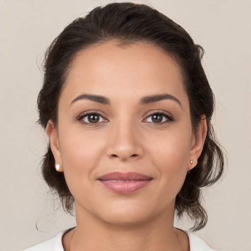 Joyful white young-adult female with medium  brown hair and brown eyes