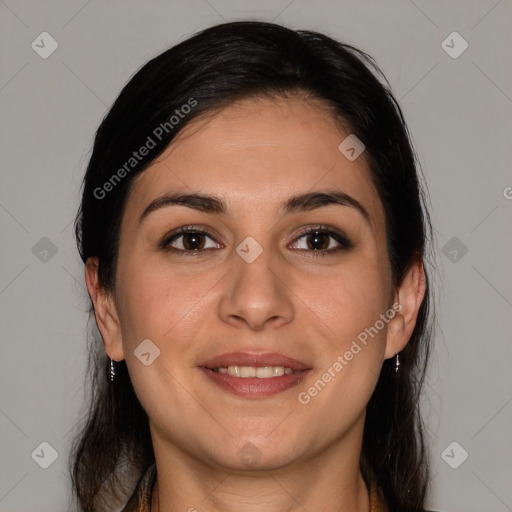 Joyful white adult female with medium  brown hair and brown eyes