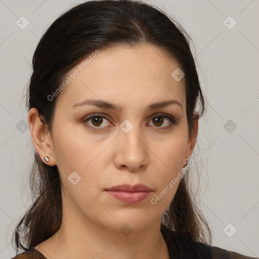 Neutral white young-adult female with long  brown hair and brown eyes