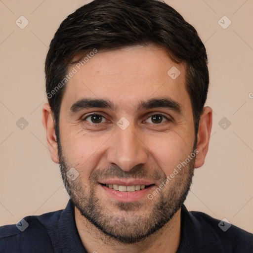 Joyful white young-adult male with short  black hair and brown eyes