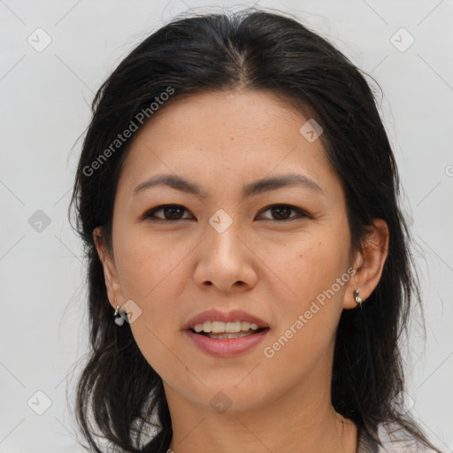 Joyful asian young-adult female with medium  brown hair and brown eyes