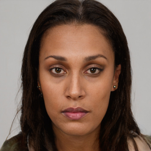Neutral black young-adult female with long  brown hair and brown eyes