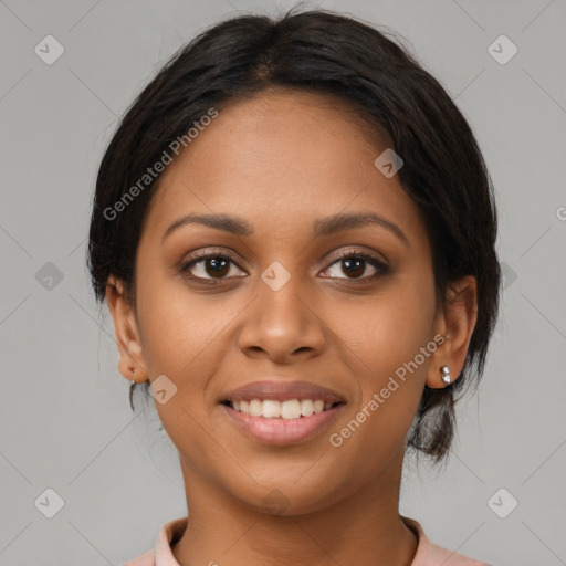 Joyful latino young-adult female with medium  brown hair and brown eyes