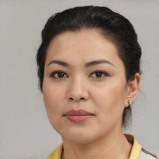 Neutral asian young-adult female with medium  brown hair and brown eyes
