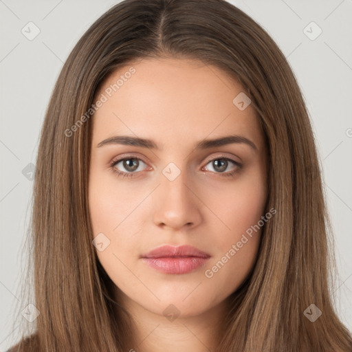 Neutral white young-adult female with long  brown hair and brown eyes