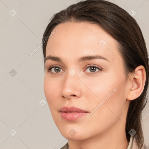 Neutral white young-adult female with medium  brown hair and brown eyes