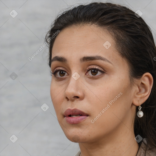 Neutral white young-adult female with long  brown hair and brown eyes