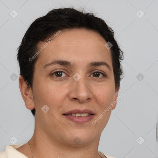 Joyful white adult female with short  brown hair and brown eyes